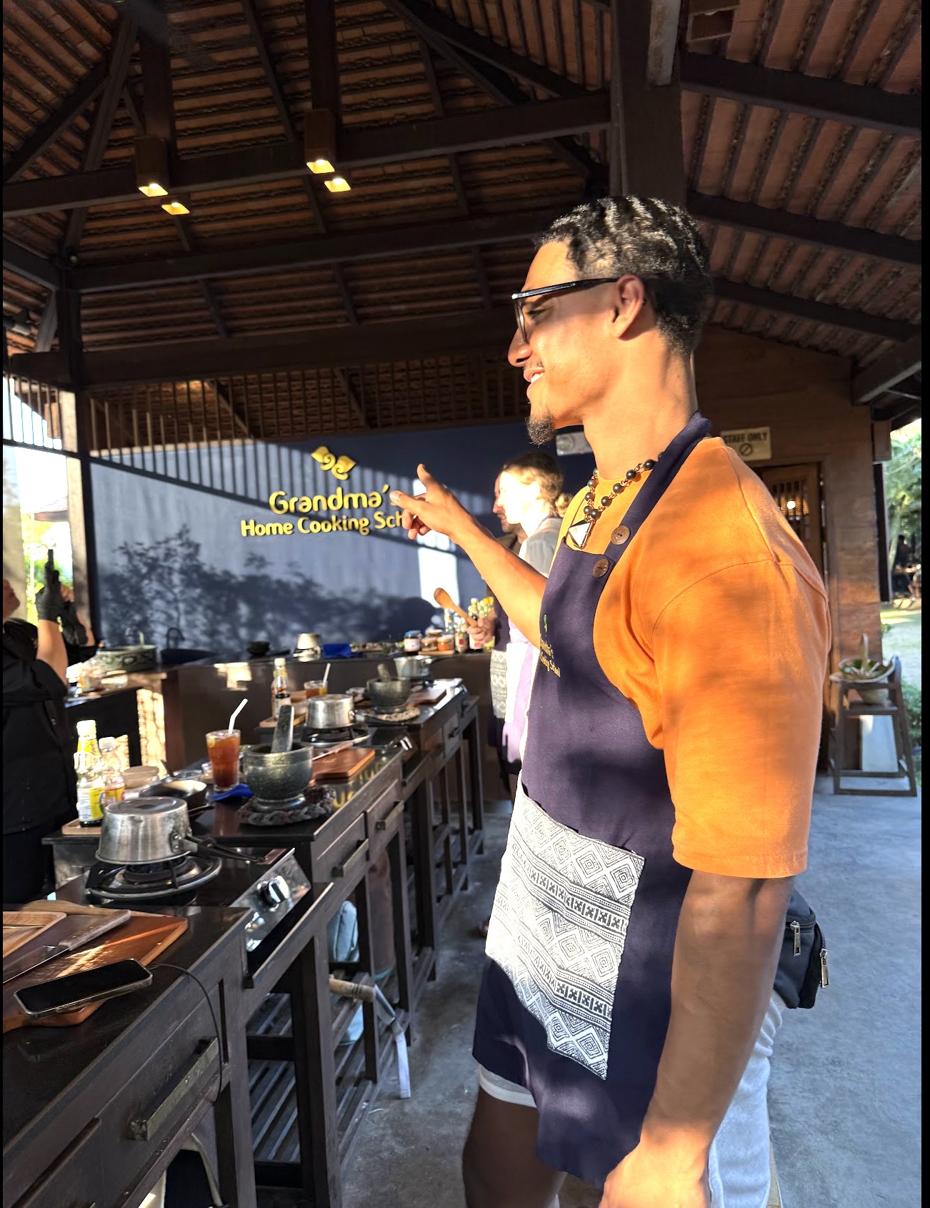 Elijah Naylor Jr. participating in a cooking education setting