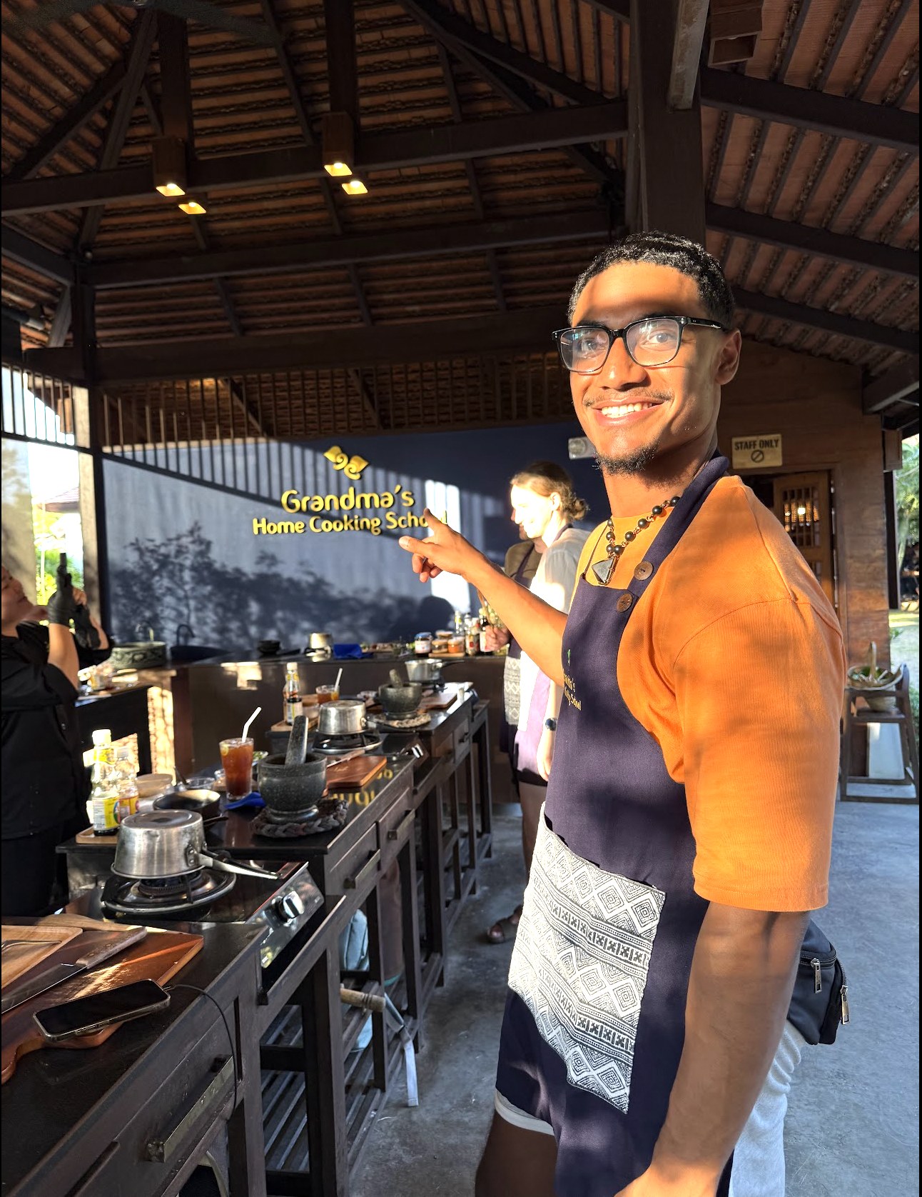 Elijah Naylor Jr. in a hands-on cooking and wellness education setting